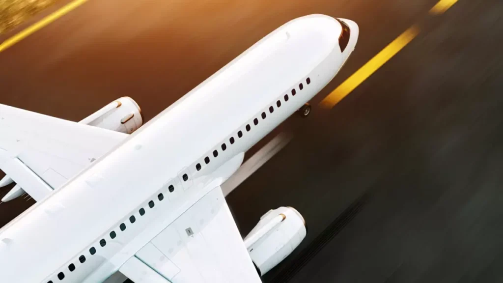Commercial aircraft parked on the apron while waiting for a replacement part